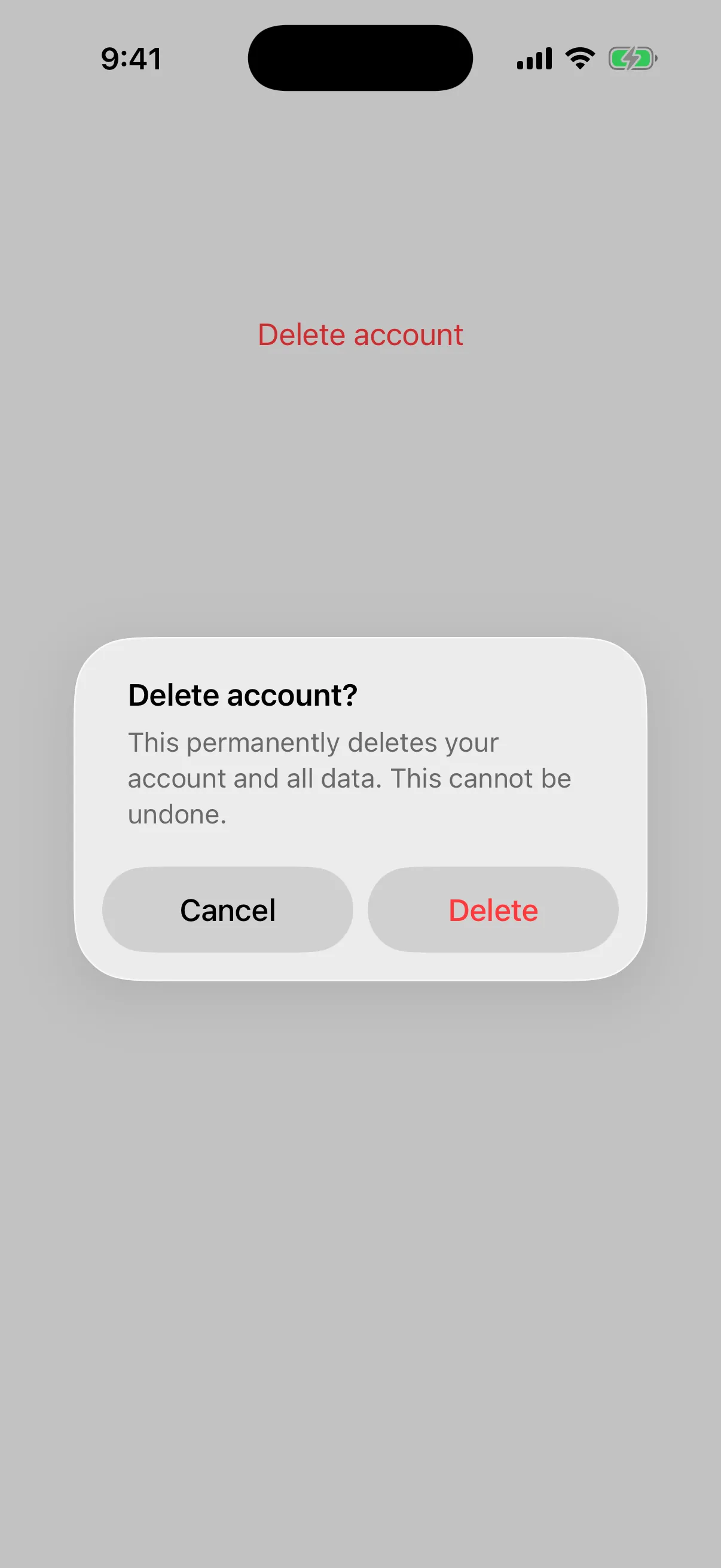 Alert titled Delete account? with a message, a Cancel button, and a red Delete button