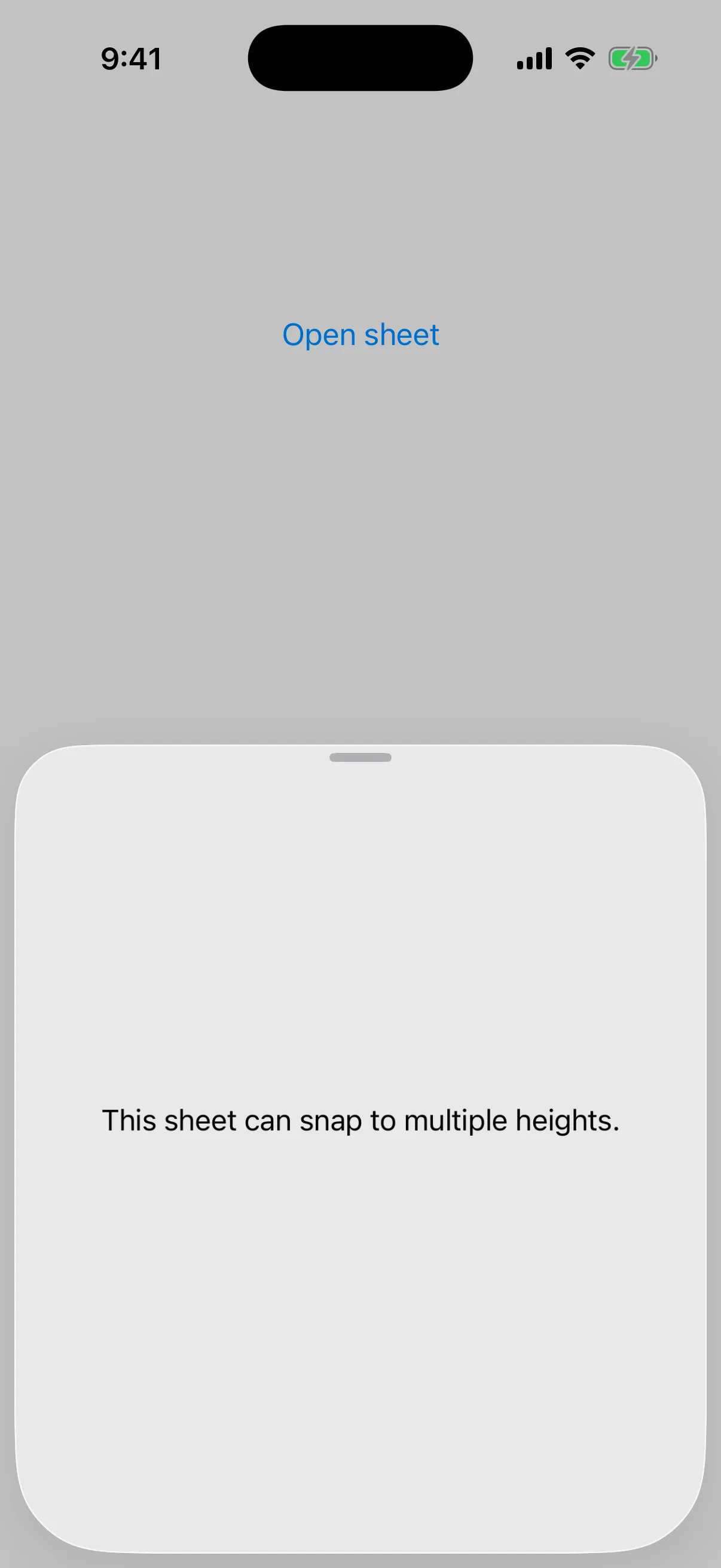 A bottom sheet at the medium detent showing text about snapping to multiple heights