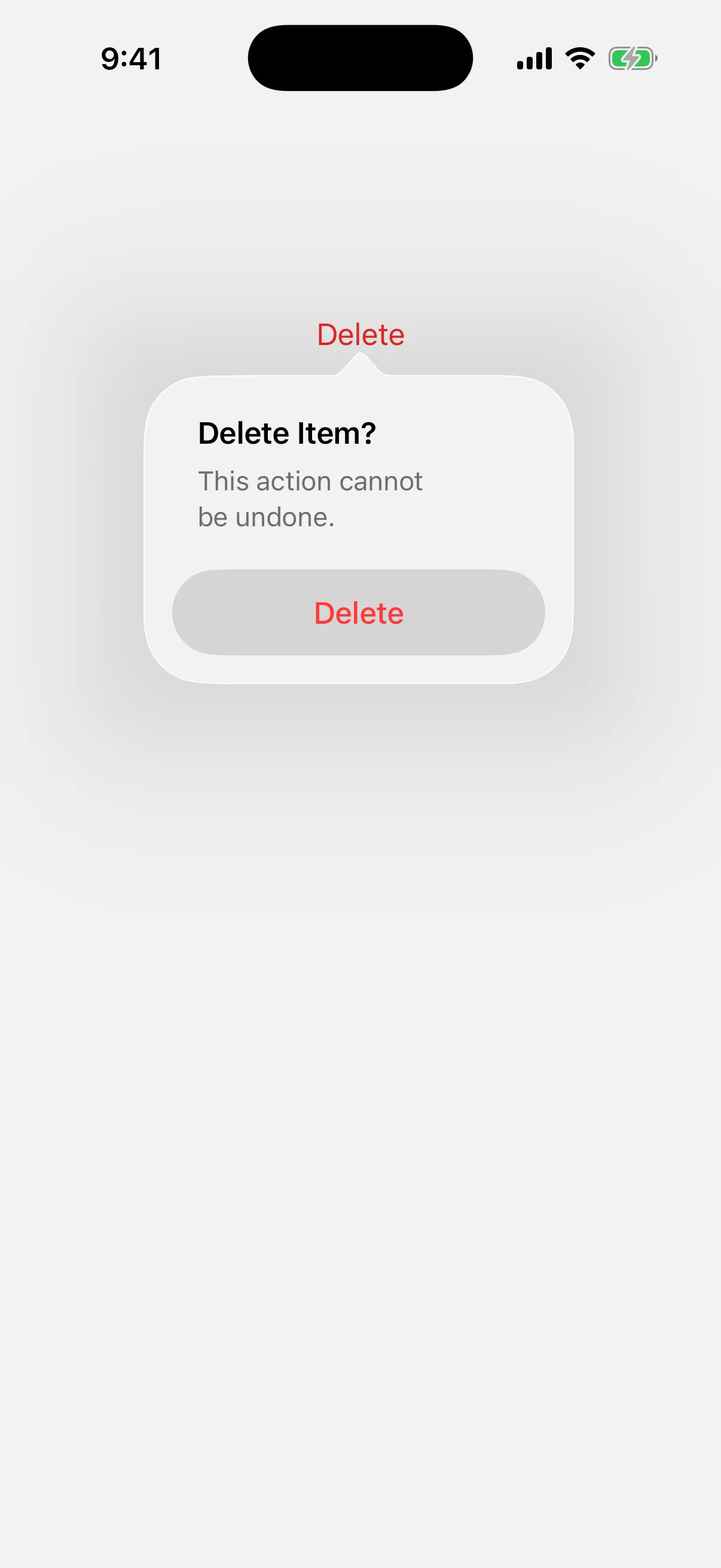A dialog titled Delete Item? with a message and a red Delete button