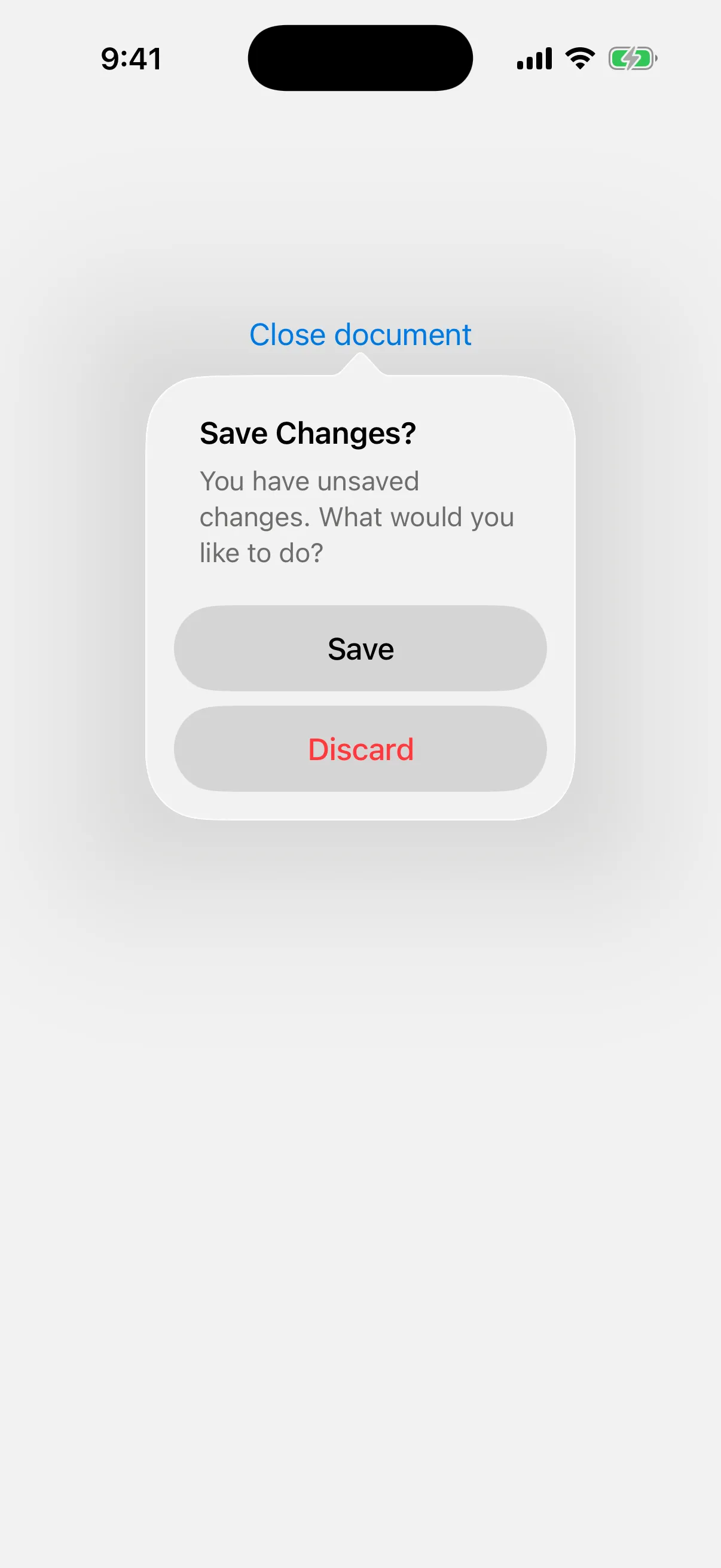 A dialog titled Save Changes? with a message, a Save button, and a red Discard button